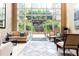 Elegant condo lobby with seating area and large windows at 2626 Peachtree Nw Rd # 706, Atlanta, GA 30305