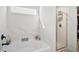 Bright bathroom with a soaking tub, glass-enclosed shower, and tile surround at 79 Dew Drop Ln, Dallas, GA 30157