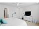 Bright bedroom featuring a comfortable queen bed, white furniture, and a ceiling fan at 79 Dew Drop Ln, Dallas, GA 30157