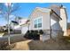Gray siding, brick base, and landscaping in front of the house at 79 Dew Drop Ln, Dallas, GA 30157