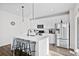 Stylish kitchen with a large island, stainless steel appliances, and modern finishes at 79 Dew Drop Ln, Dallas, GA 30157
