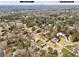 Aerial view showing home, neighborhood, and distant city skyline at 4079 Navajo Ne Trl, Brookhaven, GA 30319