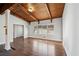 Living room with hardwood floors and access to kitchen and entryway at 4079 Navajo Ne Trl, Brookhaven, GA 30319