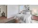 Bright bedroom with a queen bed, carpet, and a window at 525 Parkway Ne Dr # 320, Atlanta, GA 30308