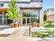 Building entrance with bike racks and well-maintained landscaping at 525 Parkway Ne Dr # 320, Atlanta, GA 30308