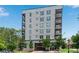 Modern apartment building with ample parking and landscaping at 525 Parkway Ne Dr # 320, Atlanta, GA 30308