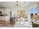 Open concept living room with hardwood floors and kitchen views at 525 Parkway Ne Dr # 320, Atlanta, GA 30308