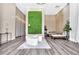 Stylish lobby with modern furniture and a green wall feature at 525 Parkway Ne Dr # 320, Atlanta, GA 30308