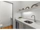 Modern wet bar with a sink and wine cooler at 910 Ponce De Leon Ne Ave # 3, Atlanta, GA 30306