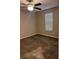 Bedroom featuring neutral walls, window, ceiling fan, and carpet, creating a cozy and inviting space at 1799 Timber Valley Se Way, Smyrna, GA 30080