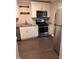 Kitchen with granite countertops, stainless steel appliances, and ample storage space at 1799 Timber Valley Se Way, Smyrna, GA 30080