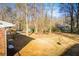 Large backyard with mature trees at 4027 Lauada Dr, Douglasville, GA 30135