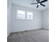 Spacious bedroom featuring carpet, ceiling fan and large windows at 4027 Lauada Dr, Douglasville, GA 30135