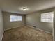 Spacious bedroom with neutral carpet and dual windows at 4208 Rue Saint Michel, Stone Mountain, GA 30083
