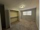 Bedroom with large closet and neutral carpeting at 4208 Rue Saint Michel, Stone Mountain, GA 30083