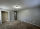 Spacious bedroom with neutral walls and carpet, featuring a large closet at 4208 Rue Saint Michel, Stone Mountain, GA 30083