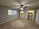 Spacious bedroom with neutral carpet, dual closets and natural light at 4208 Rue Saint Michel, Stone Mountain, GA 30083