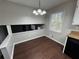 Breakfast nook area with dark flooring and a window at 4208 Rue Saint Michel, Stone Mountain, GA 30083