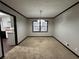 Dining room with new carpet and chandelier at 4208 Rue Saint Michel, Stone Mountain, GA 30083