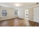 Spacious bedroom has hardwood floors and natural light from dual windows at 2159 Meadow Peak Rd, Duluth, GA 30097