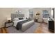 Bedroom featuring a large bed, modern decor, and natural light at 2159 Meadow Peak Rd, Duluth, GA 30097