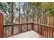 Private wooden deck overlooking wooded area, perfect for enjoying the natural surroundings at 2159 Meadow Peak Rd, Duluth, GA 30097