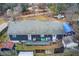 Aerial view showing home, deck, shed and surrounding yard at 2515 Impala Dr, Cumming, GA 30041
