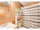 Clean bathroom with shower/tub combo, cabinet, and white vanity at 2515 Impala Dr, Cumming, GA 30041