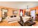 Open concept dining area with a table and chairs adjacent to the living room at 2515 Impala Dr, Cumming, GA 30041