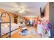 Spacious living room with hardwood floors, couches, and dining area at 2515 Impala Dr, Cumming, GA 30041