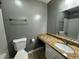 Bathroom with granite countertop and tiled shower at 5391 Walker Rd, Stone Mountain, GA 30088