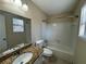Clean bathroom with granite countertop and bathtub at 5391 Walker Rd, Stone Mountain, GA 30088