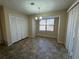 Cozy dining area with tile flooring and built-in storage at 5391 Walker Rd, Stone Mountain, GA 30088