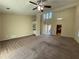 Open living area with high ceilings, fireplace, and built-in wet bar at 5391 Walker Rd, Stone Mountain, GA 30088