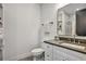 Clean bathroom featuring a white vanity, neutral tones, and a glass-enclosed shower at 564 Greystone Trce, Marietta, GA 30068