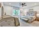 Elegant main bedroom with large bed and a crib at 564 Greystone Trce, Marietta, GA 30068