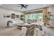Bright living room with neutral decor, comfortable sofas, and large windows for natural light at 564 Greystone Trce, Marietta, GA 30068