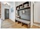 Inviting mudroom featuring custom built-ins, seating, and storage, ideal for organization and style at 564 Greystone Trce, Marietta, GA 30068