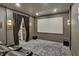 Home theater with a large screen, comfortable seating, and dark curtains for optimal viewing at 564 Greystone Trce, Marietta, GA 30068