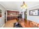 Basement dining area with wooden table and bar-style seating at 727 Tall Oaks Dr, Canton, GA 30114