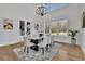 Spacious dining room with hardwood floors and large windows at 1604 Greendale Rd, Covington, GA 30014