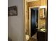 Bathroom with toilet and sink, near another room at 457 Castleaire Dr, Stone Mountain, GA 30087