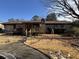 Ranch house with deck, covered patio, and fenced backyard at 457 Castleaire Dr, Stone Mountain, GA 30087