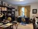 Home office with built-in shelves and desk at 457 Castleaire Dr, Stone Mountain, GA 30087