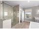 Elegant bathroom with a large walk-in shower and modern fixtures at 7535 Cordery Rd, Cumming, GA 30040