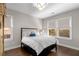 Bright bedroom featuring a comfortable bed and ample natural light at 7535 Cordery Rd, Cumming, GA 30040