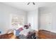 Bedroom with hardwood floors, double windows, and a closet at 1087 Longley Nw Ave, Atlanta, GA 30318