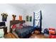 Bedroom with hardwood floors, double bed, and sports memorabilia at 1087 Longley Nw Ave, Atlanta, GA 30318