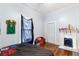 Bedroom with hardwood floors, fireplace, and closet at 1087 Longley Nw Ave, Atlanta, GA 30318