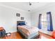 Simple bedroom with hardwood floors and a twin-sized bed at 1091 Longley Nw Ave, Atlanta, GA 30318